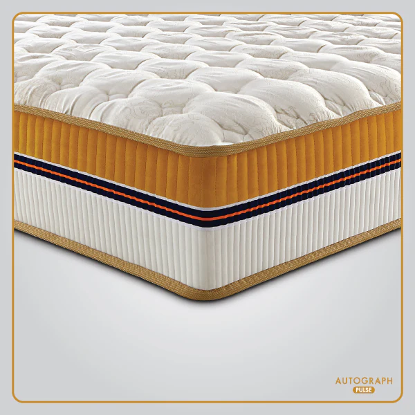 Springfit premium mattress displayed on wooden bed frame